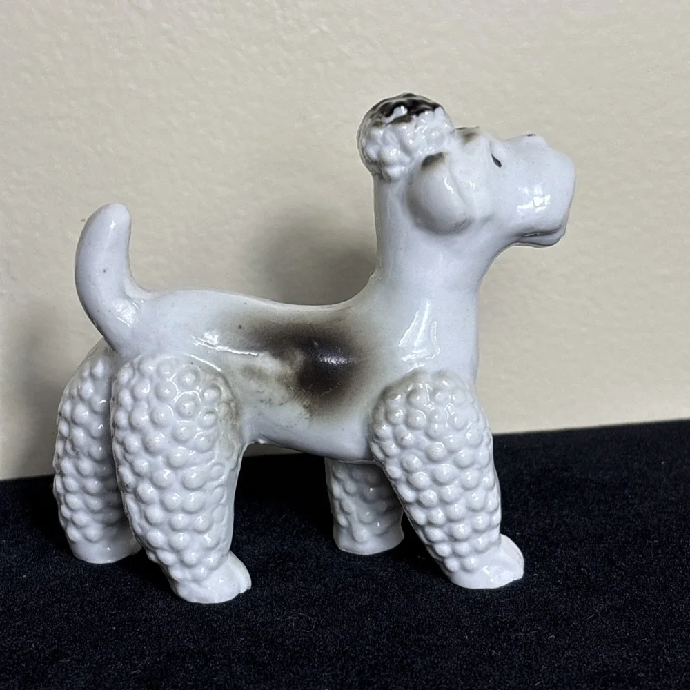 Vintage Poodle Figurine Ceramic / Porcelain Made in Japan  White w/black TopKnot